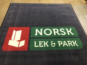 Logomatte Norsk Lek & park